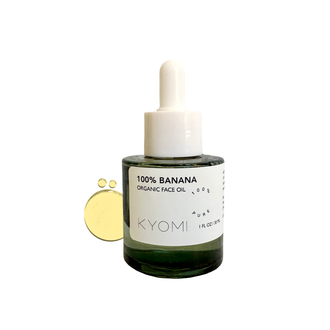 Bottle of KYOMI 100% Banana Organic Face Oil on a white background