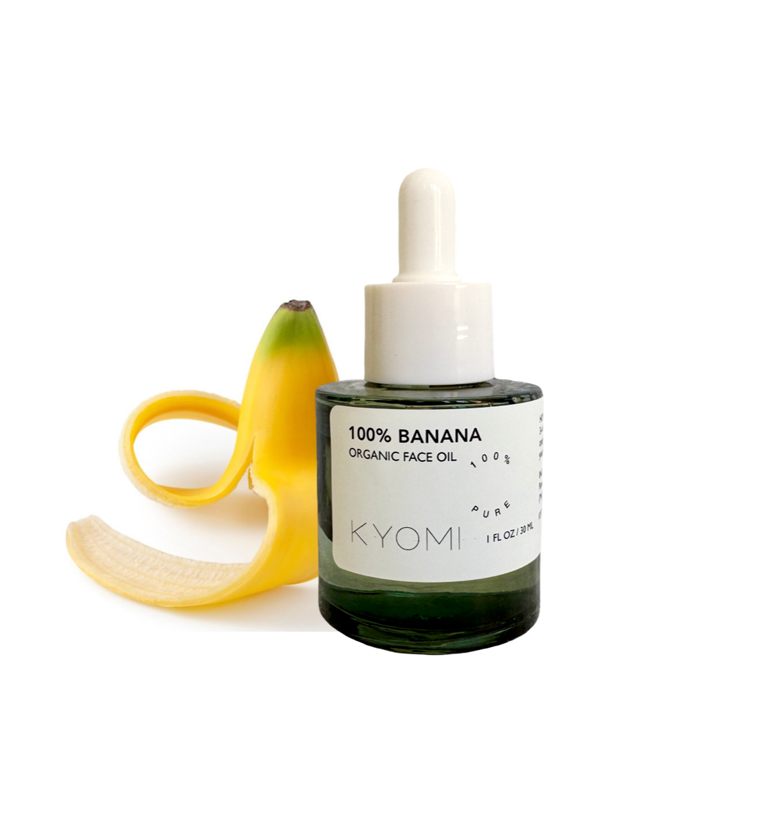 Bottle of KYOMI 100% Banana Organic Face Oil with a banana on a white background