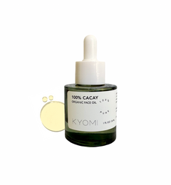 KYOMI 100% Cacay organic face oil dropper bottle on a white background