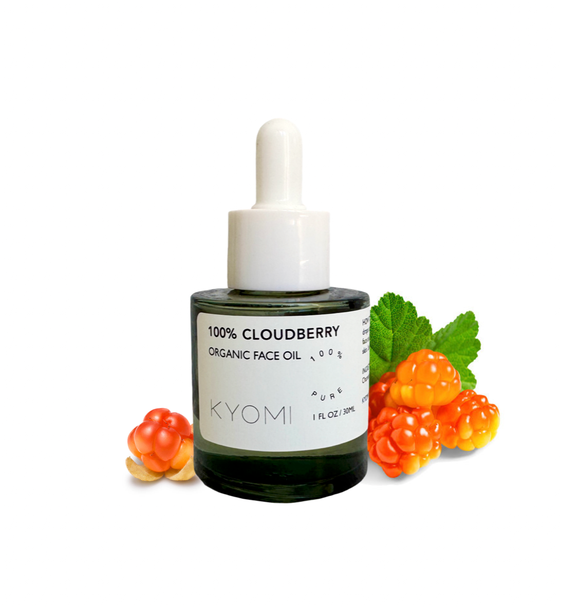 KYOMI 100% Cloudberry Organic Face Oil bottle with cloudberry fruits and leaves on a white background