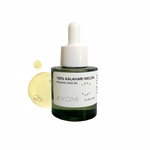 KYOMI organic face oil bottle with dropper on a white background